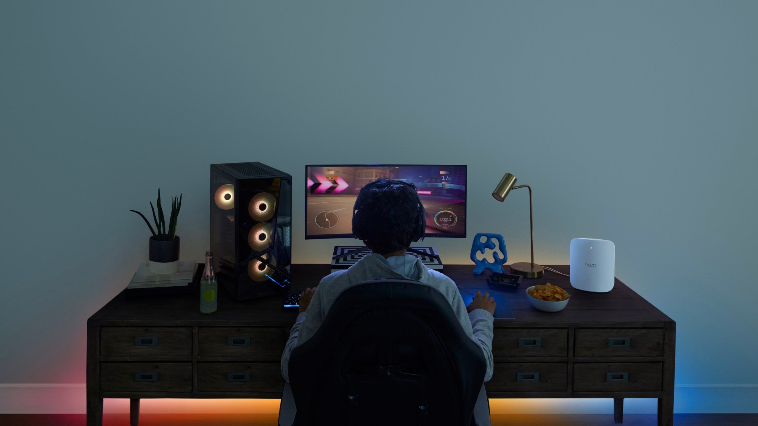 A person playing video games on a PC. 